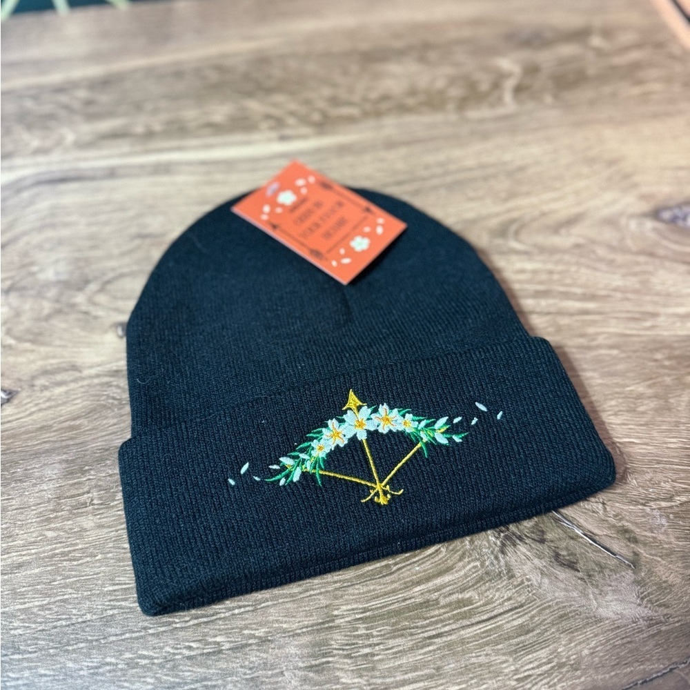 Black Odds In Your Favor Beanie with Floral Design | Hunger Games | Owlcrate